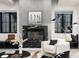 Finished basement with a fireplace and stylish decor at 1641 S Corona St, Denver, CO 80210