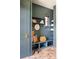 Charming mudroom features built-in bench with storage cubbies, shelves, and stylish decor at 1641 S Corona St, Denver, CO 80210