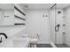Bathroom featuring a modern sink, toilet, and walk-in shower at 1601 Park Ave # 112, Denver, CO 80218
