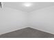 Minimalist bedroom with clean white walls and modern ceiling lighting offers a serene space at 1601 Park Ave # 112, Denver, CO 80218