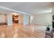 Living room featuring hardwood floors and an open concept floor plan at 701 Harlan St # E27, Lakewood, CO 80214