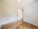 Bright bedroom with pristine hardwood floors and ample closet space perfect for storage at 835 Knox Ct, Denver, CO 80204