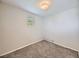 Cozy bedroom with neutral carpet, natural light from window, and flush mount ceiling light at 835 Knox Ct, Denver, CO 80204