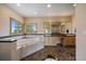 Elegant bathroom features a corner tub, marble floors, dual sinks, and a separate shower at 13007 Kuehster Rd, Littleton, CO 80127