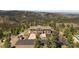 Beautiful front exterior featuring large windows, attached garage, and driveway at 13007 Kuehster Rd, Littleton, CO 80127