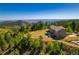 Elegant two-story home surrounded by mature trees and stunning mountain views at 13007 Kuehster Rd, Littleton, CO 80127
