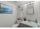 Bright half-bath featuring modern fixtures, stylish decor, and a serene ambiance at 7633 Gray Way, Arvada, CO 80003