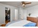 Serene main bedroom featuring hardwood floors, closet, and a peaceful ambiance at 7633 Gray Way, Arvada, CO 80003
