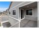 Exterior angle view of a home's backyard deck with gray siding and white railings at 2149 Peralta Loop, Castle Rock, CO 80104