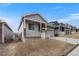 Charming single-Gathering home features stone accents, covered porch, and attached two car garage at 2149 Peralta Loop, Castle Rock, CO 80104