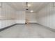Unfinished garage featuring concrete floors and walls, plus a staircase leading up to an entrance at 2149 Peralta Loop, Castle Rock, CO 80104