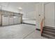 Spacious unfinished garage with concrete floors, drywall, and a garage door, perfect for storage or projects at 2149 Peralta Loop, Castle Rock, CO 80104