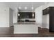 Kitchen boasts an island with marble countertops and pendant lighting at 2149 Peralta Loop, Castle Rock, CO 80104