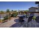 Inviting deck features a fire pit and comfortable seating, perfect for outdoor entertaining at 22739 E Prentice Pl, Aurora, CO 80015
