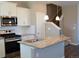 Bright kitchen featuring stainless steel appliances, granite countertops, and a stylish island at 21795 E 8Th Ave, Aurora, CO 80018