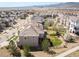 Expansive aerial view of the home showcasing its location within a picturesque neighborhood with mountain views at 2559 S Kendrick St, Lakewood, CO 80228