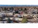 Aerial view of a ranch style home with mountain views and a spacious yard at 6740 S Clarkson St, Centennial, CO 80122