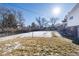 Large backyard with partial snow cover at 6740 S Clarkson St, Centennial, CO 80122