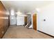 Spacious basement with neutral carpeting and ample natural light at 6740 S Clarkson St, Centennial, CO 80122