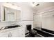 Bathroom with black fixtures and a shower/tub combo at 6740 S Clarkson St, Centennial, CO 80122