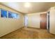 Bedroom with neutral walls, carpeting and access to a bathroom at 6740 S Clarkson St, Centennial, CO 80122