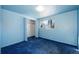 Blue bedroom with wall-to-wall carpeting at 6740 S Clarkson St, Centennial, CO 80122