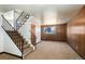 Staircase leading to the upper level of the home at 6740 S Clarkson St, Centennial, CO 80122