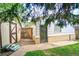 Backyard shed with wooden gate and a small garden area and stone pathway at 10342 Monterey Cir, Northglenn, CO 80260