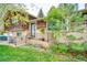 Charming home with brick and wood facade, landscaped front yard, and inviting front entrance at 10342 Monterey Cir, Northglenn, CO 80260