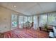 Bright sunroom featuring natural light and an outdoor view at 10342 Monterey Cir, Northglenn, CO 80260