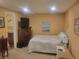 Comfortable bedroom with carpet, closet, and good natural light, creating a restful retreat at 2190 S Holly St # 213, Denver, CO 80222