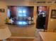 Kitchen view showcases breakfast bar, cherry cabinets, recessed lighting and stainless steel appliances at 2190 S Holly St # 213, Denver, CO 80222
