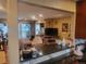 Open concept living room viewed from the kitchen with ample space for entertaining guests or Gathering at 2190 S Holly St # 213, Denver, CO 80222