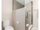 Well-appointed bathroom with modern fixtures, a glass shower, and neutral color palette at 1318 Yates St, Denver, CO 80204