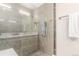 Modern shower with glass enclosure, tile surround, and contemporary fixtures at 1318 Yates St, Denver, CO 80204
