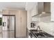 Modern kitchen features stainless steel appliances and sleek, minimalist design at 1318 Yates St, Denver, CO 80204