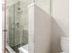 Modern bathroom features a glass-enclosed shower with contemporary fixtures and tiled walls at 1318 Yates St, Denver, CO 80204