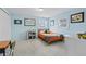 Cozy ' bedroom features playful decor, bright windows, and comfortable furniture at 3966 S Magnolia Way, Denver, CO 80237