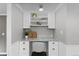 Charming home office nook with built-in shelves and a marble countertop desk at 3966 S Magnolia Way, Denver, CO 80237