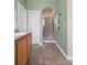 Bathroom with a shower, sink and toilet featuring ceramic tile flooring at 10162 Bluffmont Ln, Lone Tree, CO 80124