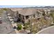 Exterior of a two-story home with a well-manicured lawn and a two-car garage and beautiful roof at 10162 Bluffmont Ln, Lone Tree, CO 80124
