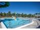 Community pool includes an activity splash pad and stairs for easy access at 10162 Bluffmont Ln, Lone Tree, CO 80124