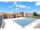 Apartment complex featuring a fenced in pool and clubhouse at 10211 Ura_ Ln # 101, Thornton, CO 80260