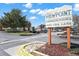 Welcoming entrance sign to Viewpoint Condominiums at 10211 Ura Lane with manicured landscaping at 10211 Ura_ Ln # 101, Thornton, CO 80260