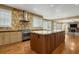 Gourmet kitchen with large island, stainless steel appliances, and custom cabinetry at 2931 W 110Th Ct, Westminster, CO 80234