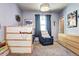 Comfortable bedroom featuring a lofted bed with a built-in basketball hoop at 852 Kalamath St, Denver, CO 80204