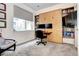 Home office with Murphy bed, built-in shelves, and desk providing space-saving functionality at 852 Kalamath St, Denver, CO 80204