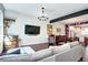 Bright living area with a comfortable sofa, TV, and stylish accents at 852 Kalamath St, Denver, CO 80204