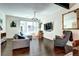 Inviting living room with a comfortable sofa, large window, and hardwood floors at 852 Kalamath St, Denver, CO 80204