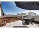 Rooftop deck offering seating, planters, and fire pit with city views for outdoor entertaining at 852 Kalamath St, Denver, CO 80204